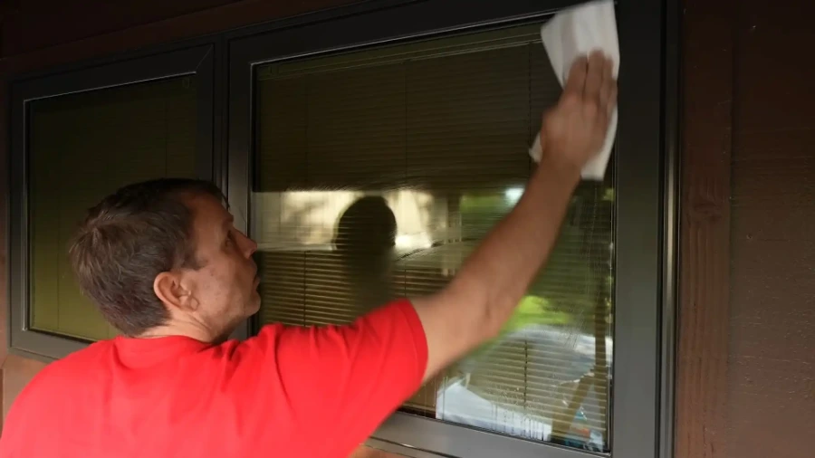 Close detail work on a residential window frame in San Clemente